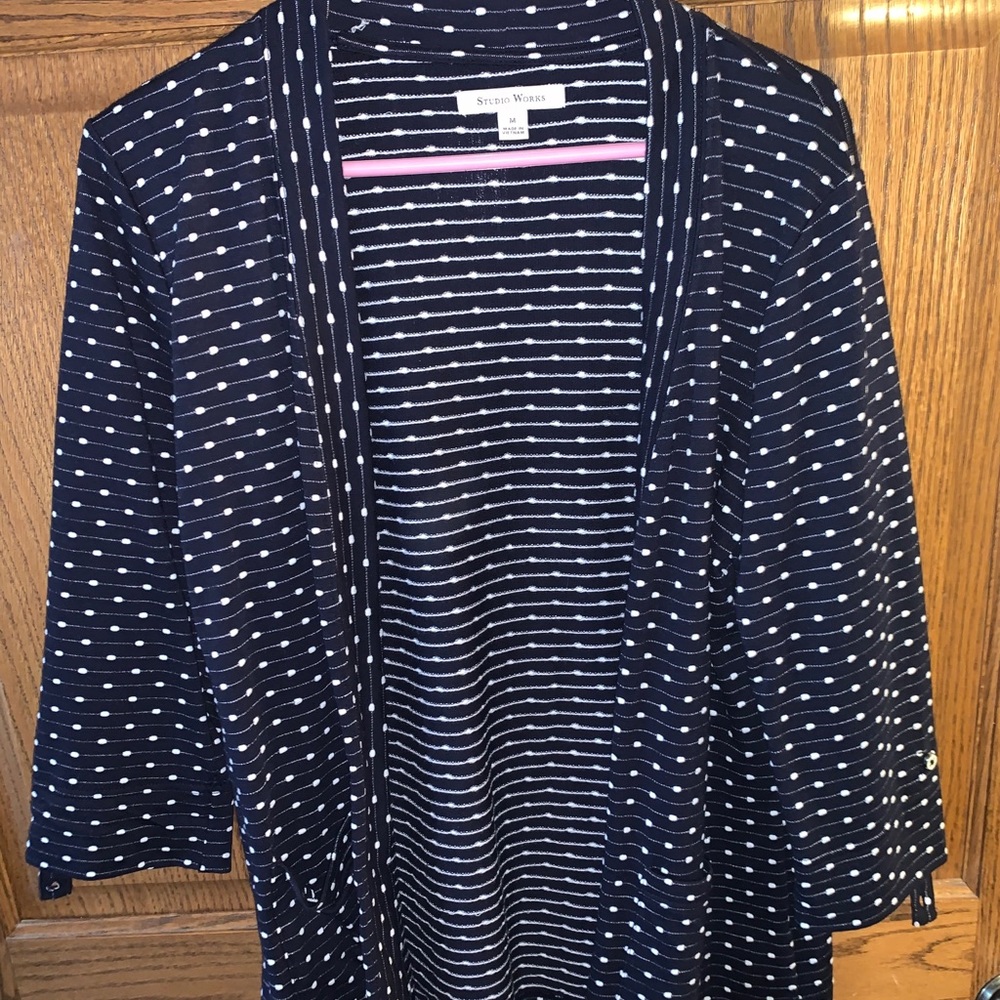 Flattering navy blue cardigan.